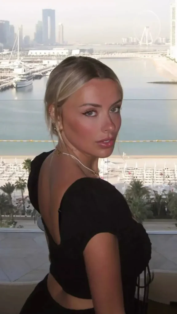 Corinna Kopf beautiful shot on sea with high rise buildings