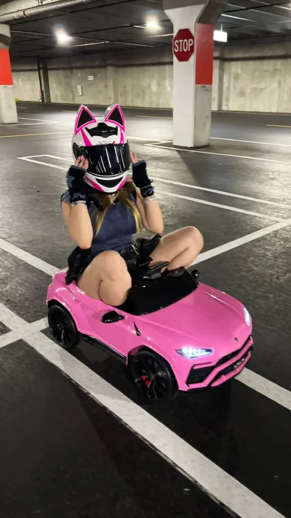 katiana kay sitting on child car funny pose